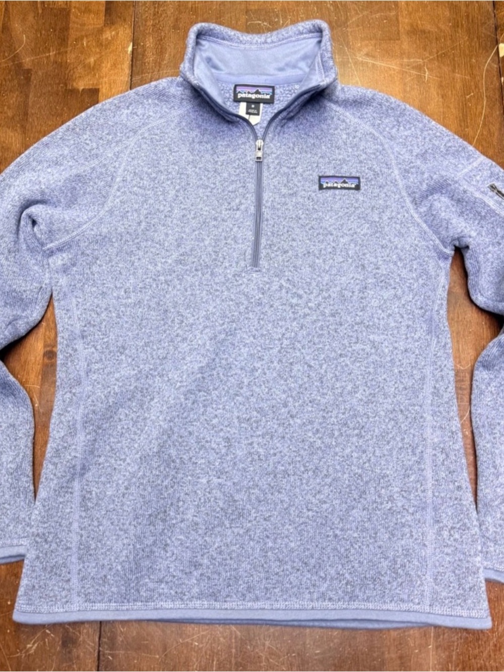 Patagonia Women’s Quarter-Zip Fleece Sweater in Light Purple.